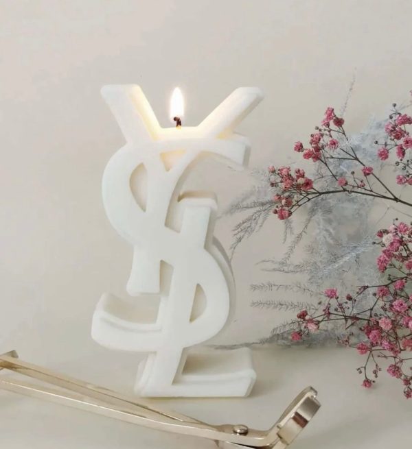 Yves Saint Laurent Candle. High Fashion Sign Candle. YSL. Luxury HomeDecor, Designer Scent, YSLStyle, High End Decoration, Exclusive Fragrance, FashionHouseAmbiance, Sophisticated Decor, Chic Living Supply